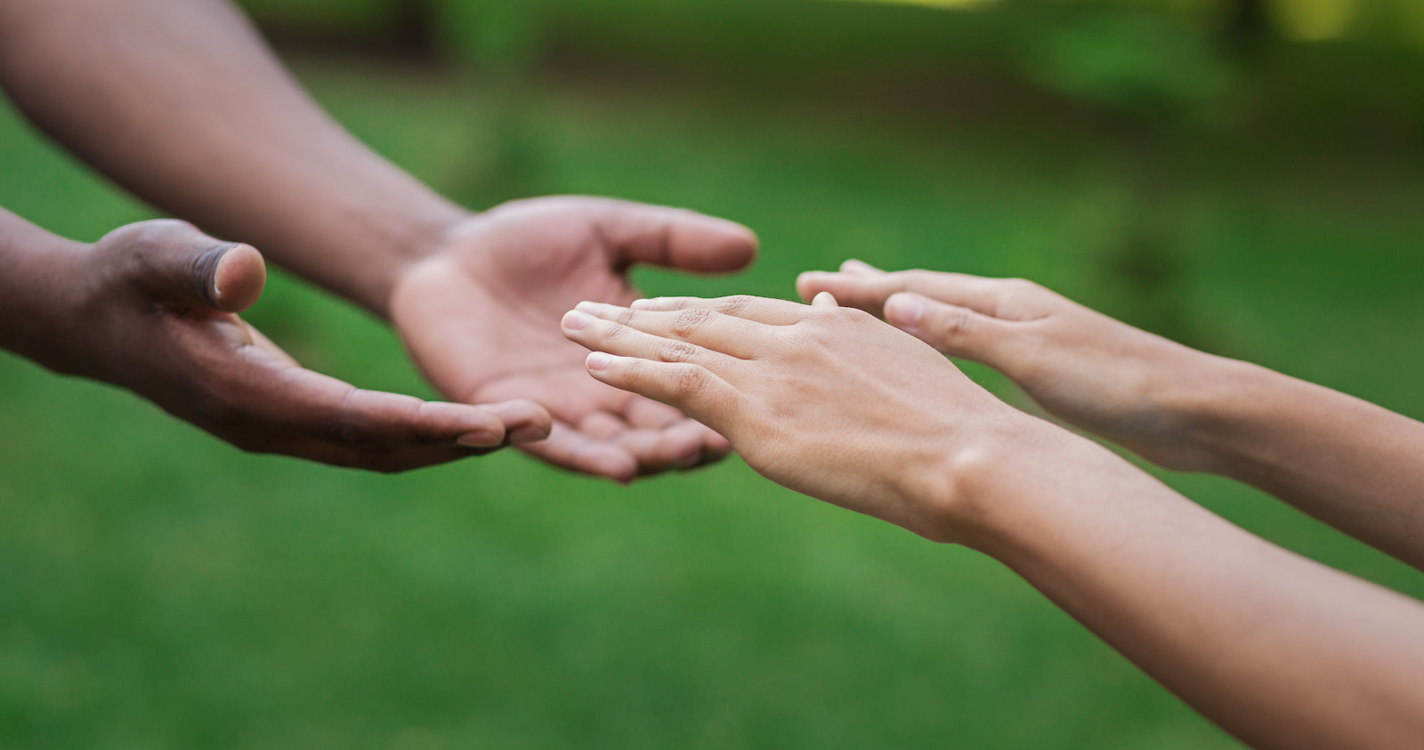 Diverse male and female hands stretch to each othe 2026 01 08 23 23 18 utc 1